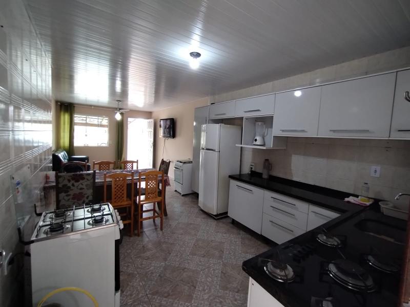 CASA DE FRENTE PARA A AVENIDA PARANÁ. - Cavalheiro Imóveis